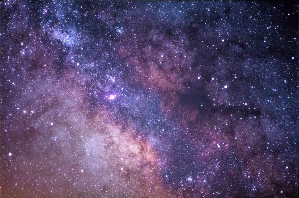 A vast night sky filled with stars and the band of the Milky Way galaxy.